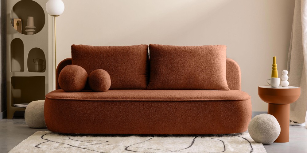 Sofa z funkcją spania i pojemnikiem Bella miedziana, boucle