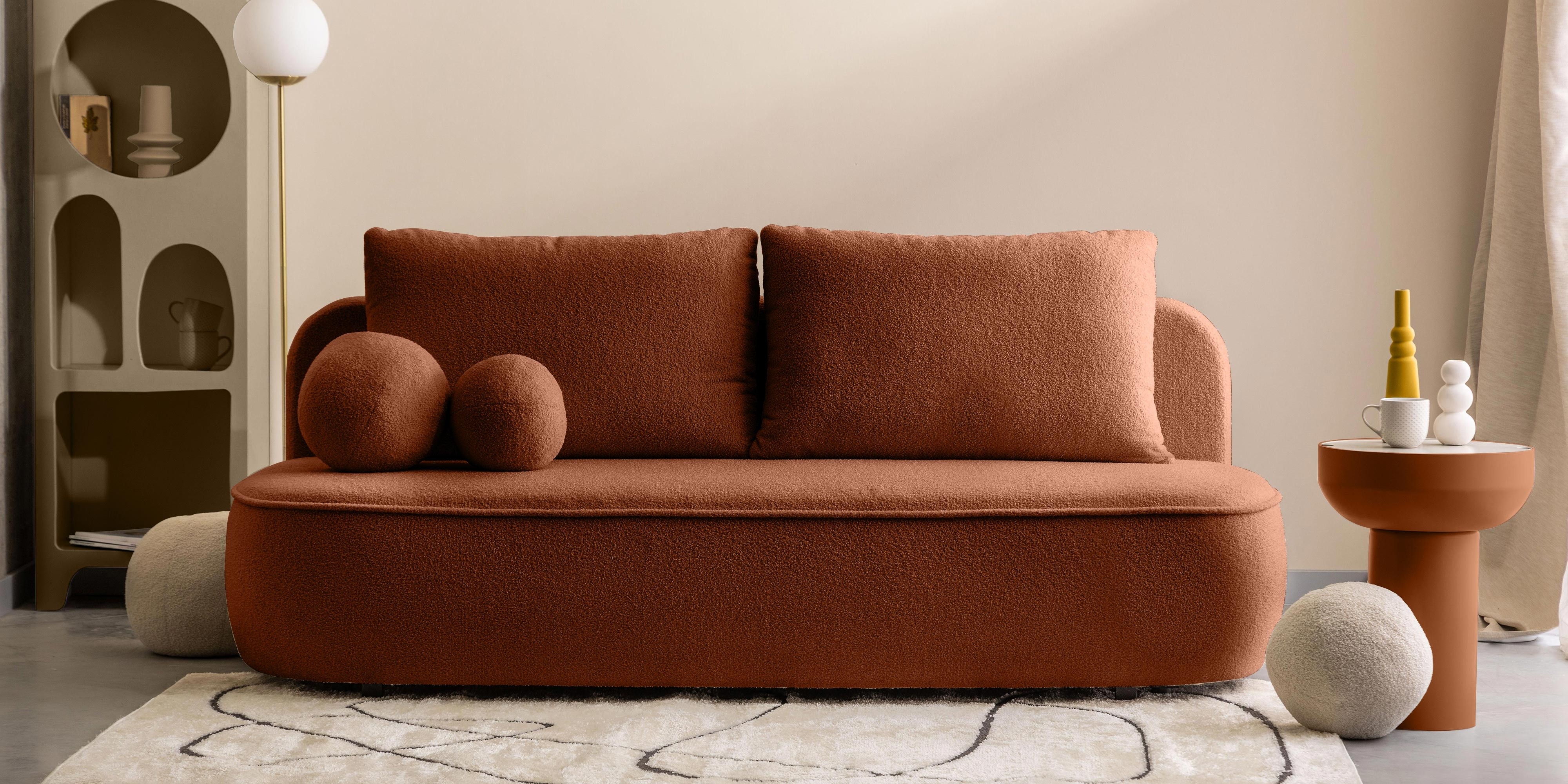 Sofa z funkcją spania i pojemnikiem Bella miedziana, boucle