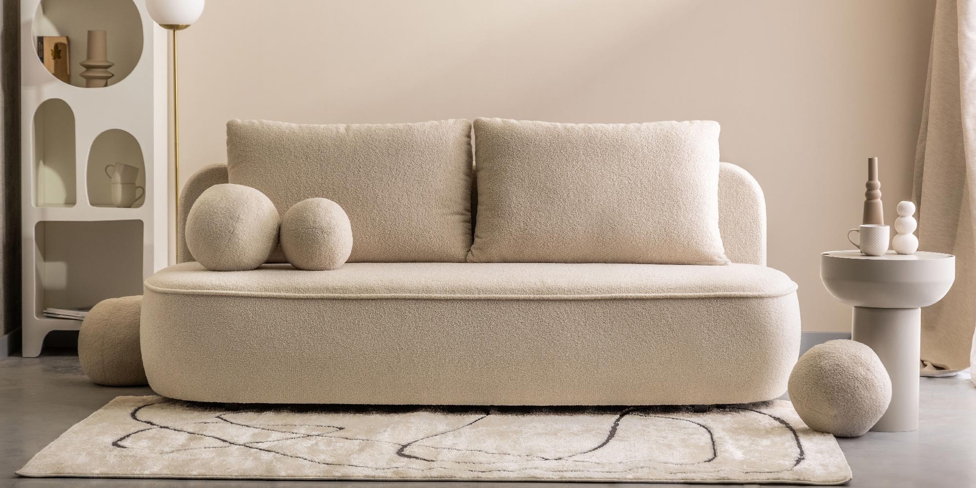 Sofa z funkcją spania i pojemnikiem Bella jasnobeżowa, boucle