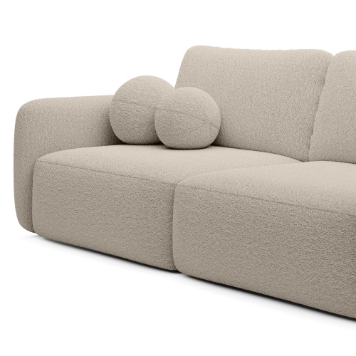 Sofa rozkładana Botse jasnobeżowa z pojemnikiem, obłe kształty, boucle