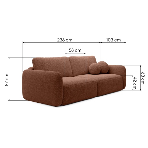 Sofa rozkładana Botse miedziana z pojemnikiem, obłe kształty, boucle