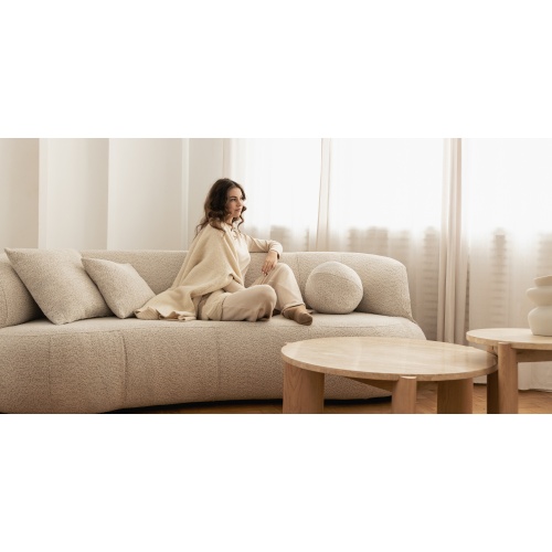 Sofa do salonu Elba beżowa, boucle, zaokrąglony kształt