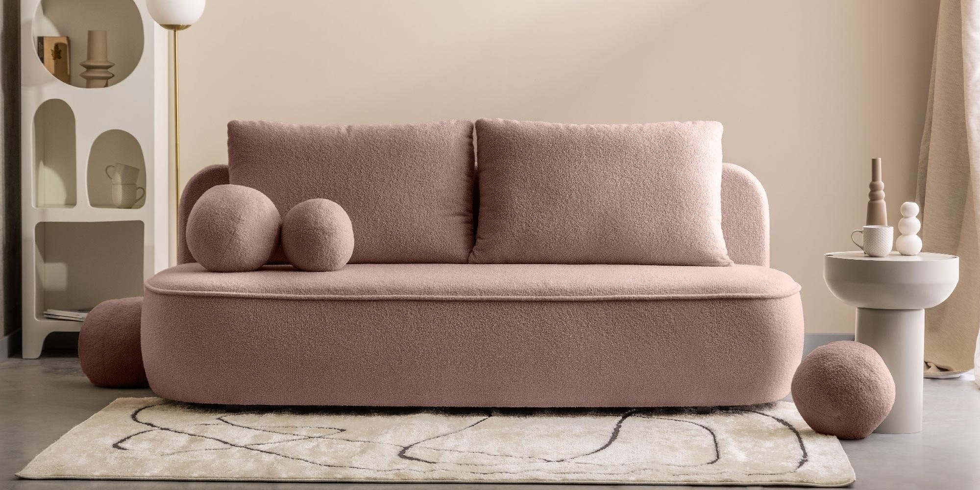 Sofa z funkcją spania i pojemnikiem Bella różowa, boucle